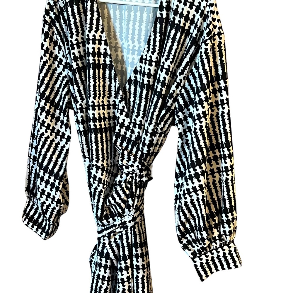 Eloqui black and white wrap dress.